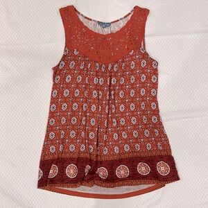 Small, burnt orange color tank, flowy, comfortable